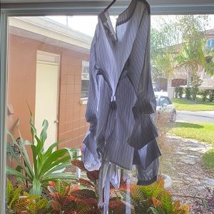 Women Ruffle blouse. White with blue stripes.